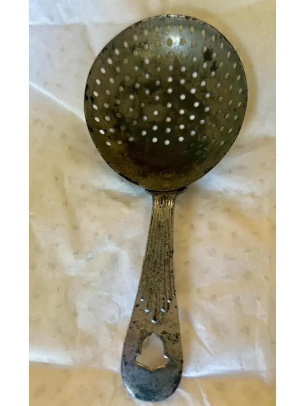 Vintage Metal Strainer Spoon with Decorative Handle